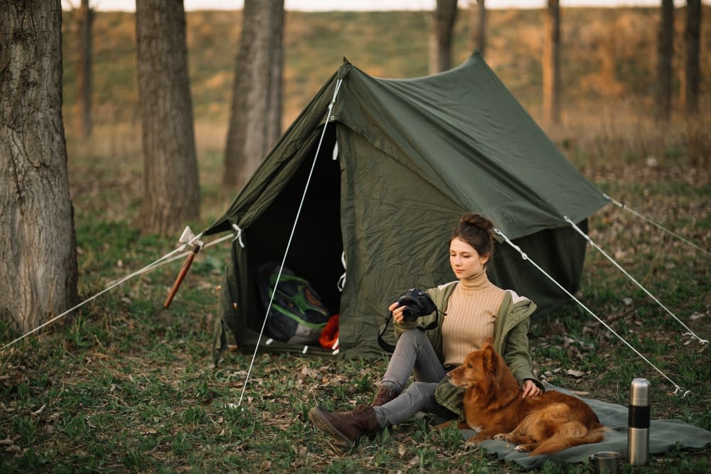 full-shot-woman-dog-near-tent easy set up camping tents